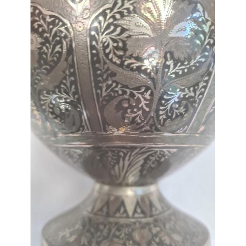 111 - Persian silver and copper inlaid bottle vase with all-over formal foliate and anthemion decoration o... 