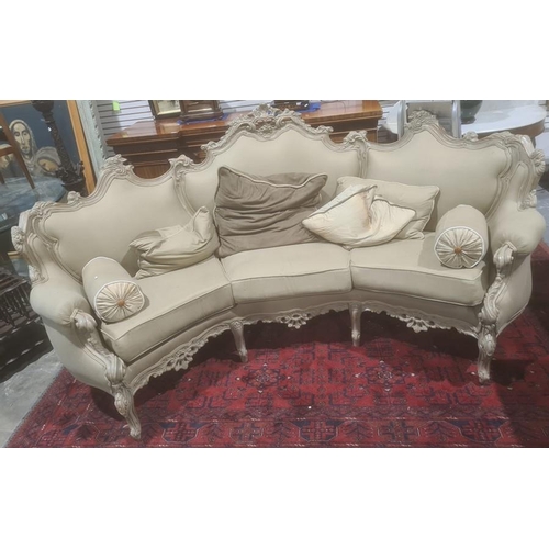 1418 - Modern French-style beige painted and upholstered curved three-seat sofa and cushions