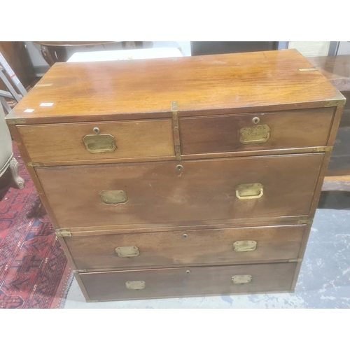 1422 - Probably late Victorian mahogany campaign chest, the rectangular top with brass bindings, two short ... 