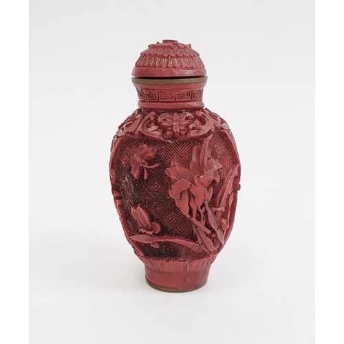 145 - Chinese carved cinnabar lacquer snuff bottle, slender ovoid with panels of flowers, 6.5cm high, Qian... 