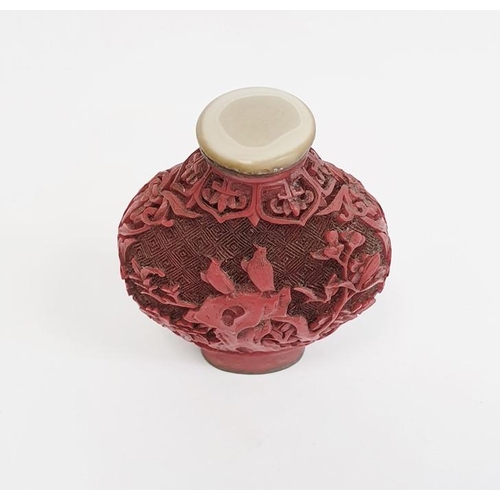 146 - Chinese Qianlong marked carved cinnabar lacquer snuff bottle, disc shaped, 6cm high