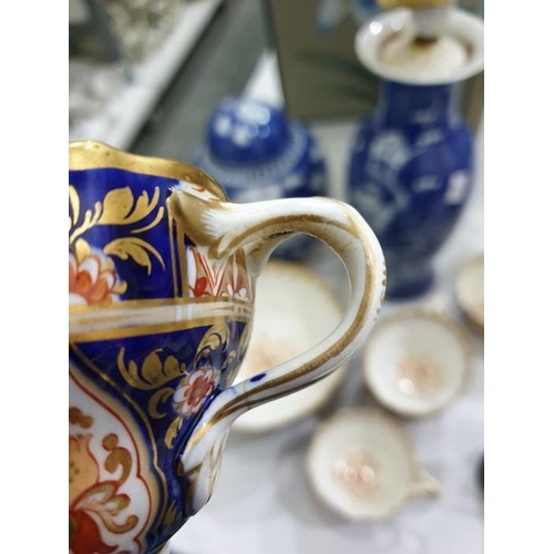 15 - English porcelain Imari pattern part tea service of fluted form, 1820's, printed and painted in gilt... 