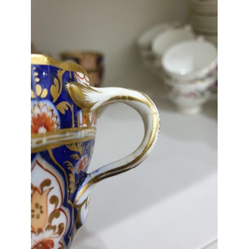 15 - English porcelain Imari pattern part tea service of fluted form, 1820's, printed and painted in gilt... 