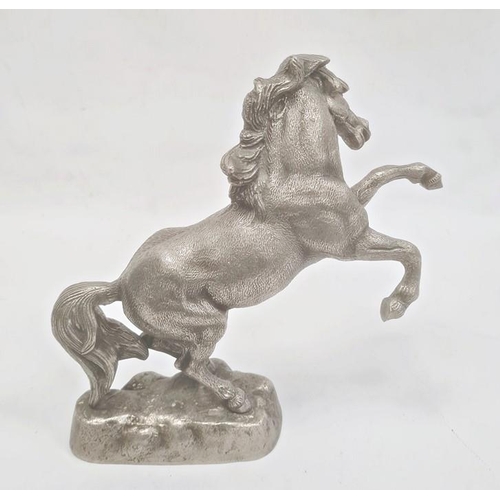 170 - Cast metal model of rearing horse on rocky base, 33cm high