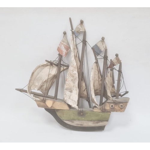 186 - Painted and carved wooden naval model of a quadruple masted sailing galleon, 31cm high x 34cm wide