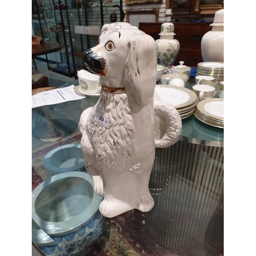 2 - Pair of Staffordshire pottery models of spaniels, circa 1880, modelled in opposing directions, their... 