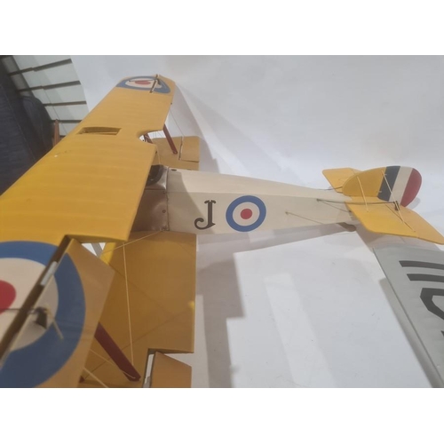 217 - Model of a bi-plane, probably Sopwith Camel, painted wood and metal, wing span 74cm, and another sma... 