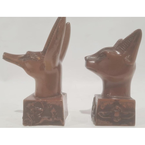 226 - An Egyptian resin model head of a cat and a dog (2) 10cm and 11.5cm high approx.