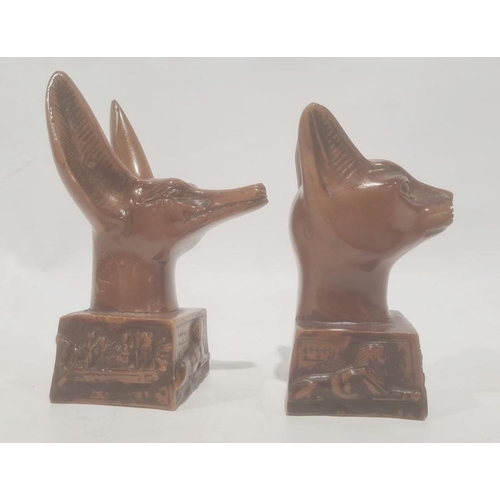 226 - An Egyptian resin model head of a cat and a dog (2) 10cm and 11.5cm high approx.