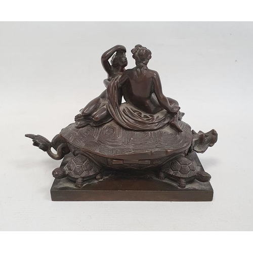 238A - A 19th century bronze inkwell in the form of two nude classical figures seated atop Bixi, a dragon w... 