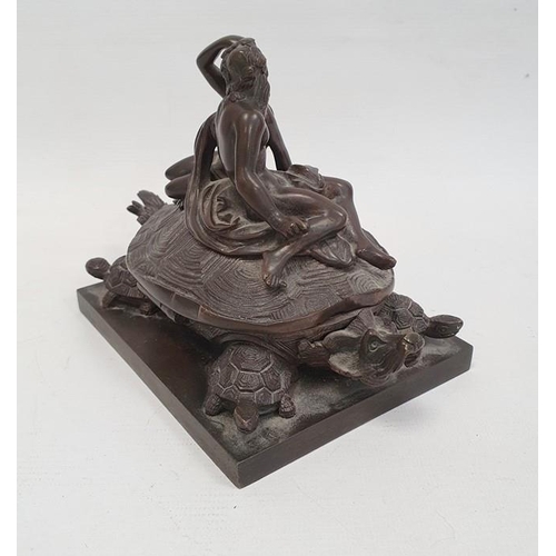 238A - A 19th century bronze inkwell in the form of two nude classical figures seated atop Bixi, a dragon w... 