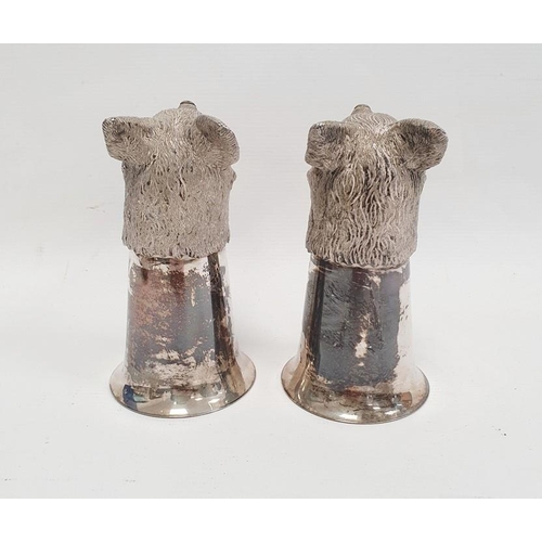 377 - A pair of silver coloured metal fox head stirrup cups, 12cm approx. (2)