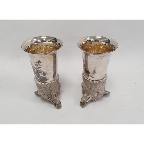 377 - A pair of silver coloured metal fox head stirrup cups, 12cm approx. (2)