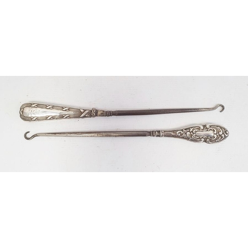 389 - Two silver-handled button hooks, Birmingham 1906 and Birmingham 1903 (2)