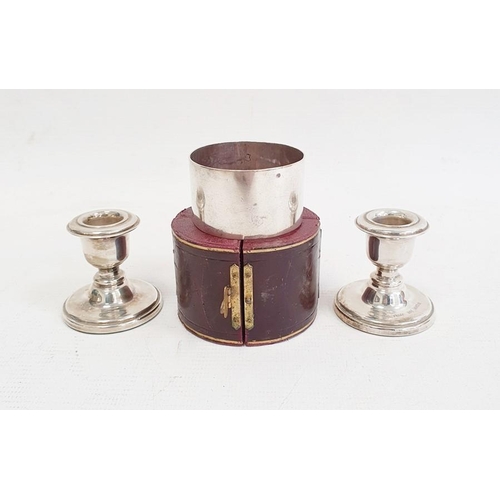 397 - Pair of 1980's silver-mounted squat candlestick holders on circular bases, Birmingham 1984, marked '... 