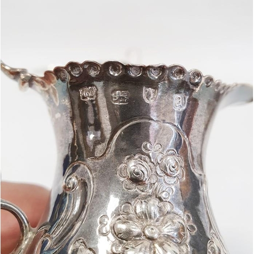 429 - George III silver cream jug, makers mark 'IO', London 1816 with later floral decoration, 10cm high, ... 