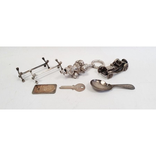 432 - Victorian silver rattle, Birmingham 1893, with floral scrolling decoration with integral whistle and... 