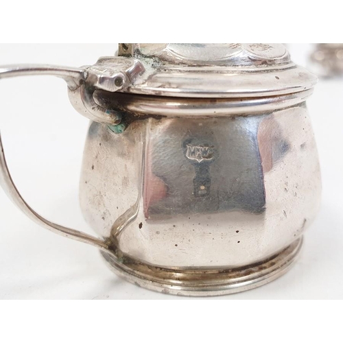 435 - Silver salt by Mappin & Webb, Birmingham 1925 and a matching mustard pot and cover, both of panelled... 