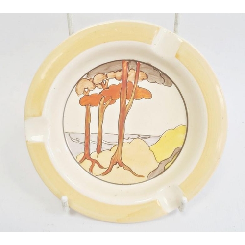 52 - Wilkinson Limited Clarice Cliff ashtray of circular form decorated in the 'Coral Firs' pattern, 12.5... 