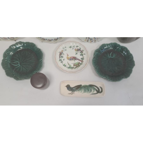 8 - Quimper-style faience plate with figure to centre, another pair, bird decorated, two green leaf moul... 