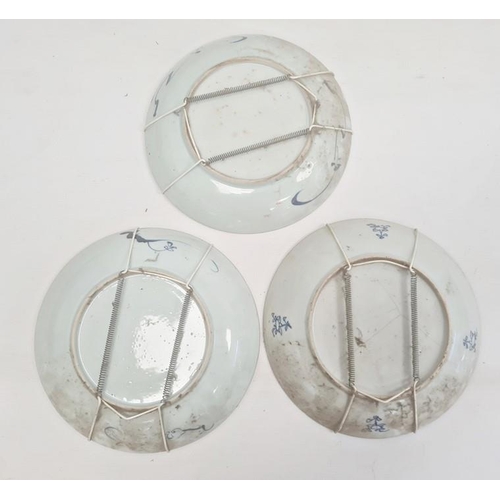 15 - Pair of blue and white plates each decorated with trailing blossom with diaper borders, 22cm diamete... 