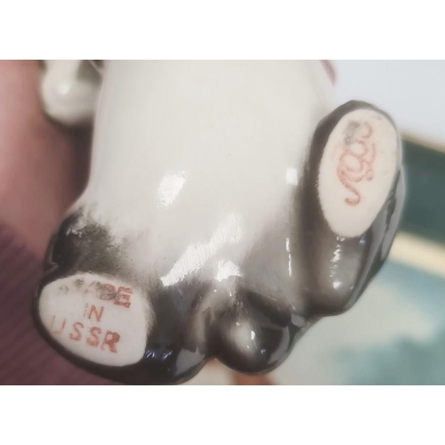 25 - Collection of ceramic figures including Royal Dux, USSR (Lomonosov) and Wade Nat West pig money boxe... 