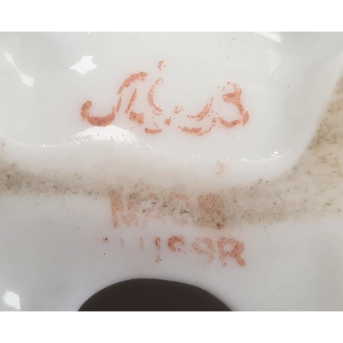 25 - Collection of ceramic figures including Royal Dux, USSR (Lomonosov) and Wade Nat West pig money boxe... 