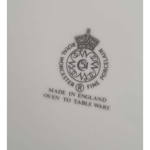 27 - Quantity Royal Worcester 'Evesham' pattern oven to tableware to include flan dishes and covered cass... 