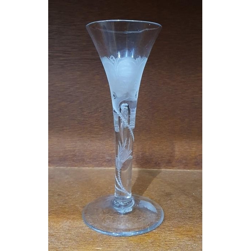 70 - Mid 18th century wine glass with trumpet bowl, the stem and bowl engraved with Jacobite Rose decorat... 