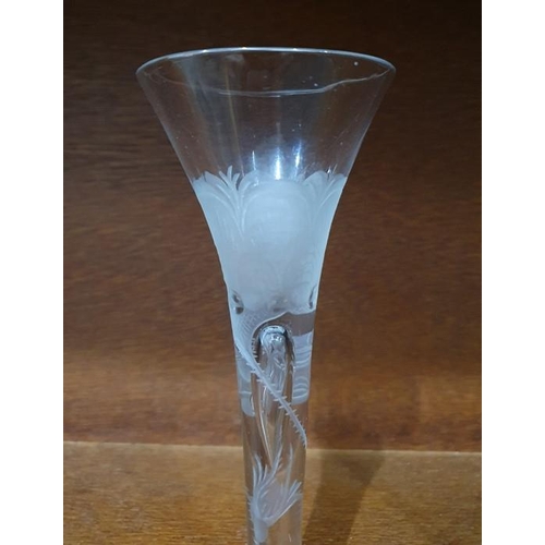 70 - Mid 18th century wine glass with trumpet bowl, the stem and bowl engraved with Jacobite Rose decorat... 