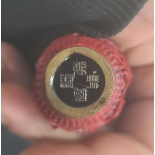 83 - Chinese carved cinnabar lacquer snuff bottle, slender ovoid with panels of flowers, 6.5cm high, Qian... 