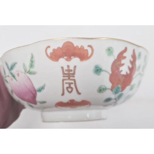 85 - Pair of Chinese bowls, the exteriors with enamelled decoration of fruit, bats and character marks, r... 