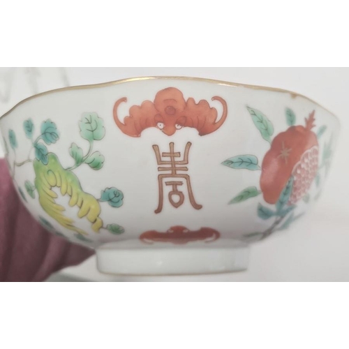 85 - Pair of Chinese bowls, the exteriors with enamelled decoration of fruit, bats and character marks, r... 