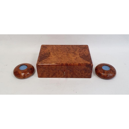 1055 - Modern burrwood box of rectangular form with fitted interior, 26cm long and a pair of matching tea l... 