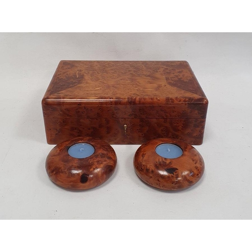 1055 - Modern burrwood box of rectangular form with fitted interior, 26cm long and a pair of matching tea l... 