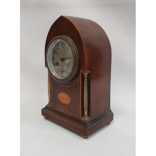 1056 - Mahogany satinwood inlay mantel clock arched top Arabic numerals to the metal dial turned plasters, ... 