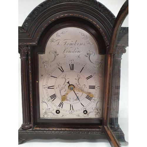 1065 - Mantel alarm clock the moulded arch top above single glazed door enclosing steel face marked 'JN Tom... 