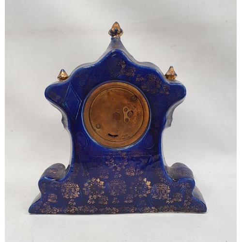 1069 - Ceramic bodied mantel clock by Royal Warwick, blue ground with gilt decoration and Arabic numerals t... 