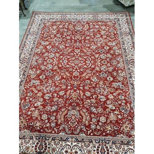 1094 - Modern red ground rug with allover foliate decoration, cream ground foliate decorated border, 398cm ... 