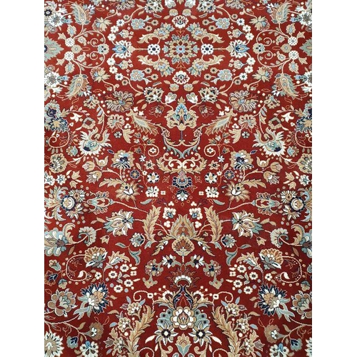 1094 - Modern red ground rug with allover foliate decoration, cream ground foliate decorated border, 398cm ... 