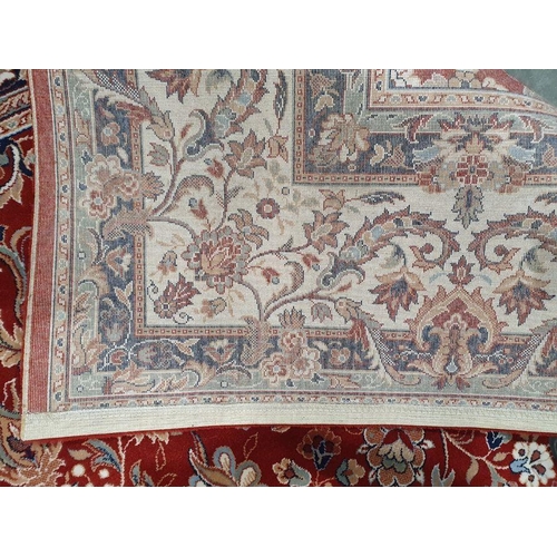 1094 - Modern red ground rug with allover foliate decoration, cream ground foliate decorated border, 398cm ... 