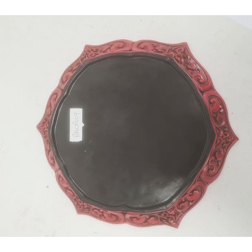 112 - 20th century Chinese cinnabar red lacquer hexagonal shaped dish, relief decorated with figure riding... 