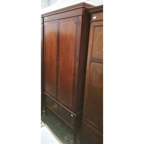 1122 - 20th century modern three door wardrobe together with matching two door wardrobe (2)