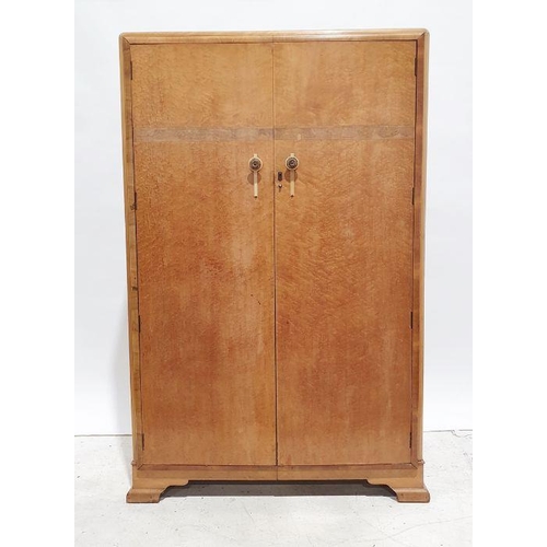 1192 - Two Art Deco two door-wardrobes in bird's eye maple, walnut inlay, ogee bracket feet (2)