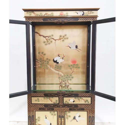 1219 - Pair of Chinese style cabinets with painted decoration, two closed doors above two single drawers, t... 