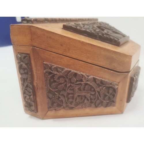 123 - Carved stationery box, the hinged cover and sides with applied carved panels, possibly Indian, depic... 