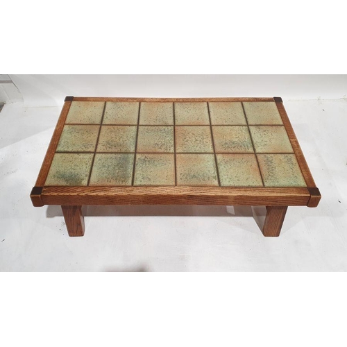 1241 - 20th century tile-top coffee table on oak frame, 132 x 43cm