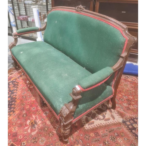 1402 - Victorian sofa mahogany frame, green upholstered seat back and armrests, turned and fluted front leg... 