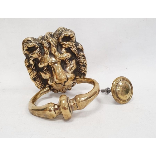 157 - Brass door knocker modelled as a lion's mask with ring handle and knocking plate