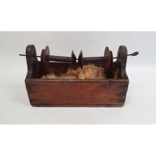 172 - 19th century winder fitted with two wooden spools over a pine base, 26cm long